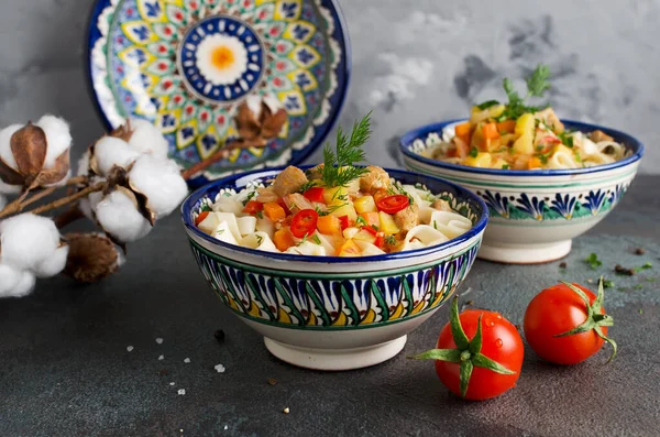 Uzbek lagman soup with noodles, meat and vegetables. Traditional Uzbek cuisine. — Stock Image Uzbek Lagman Soup Noodles Meat Vegetables Traditional Uzbek Cuisine Royalty Free Stock Images