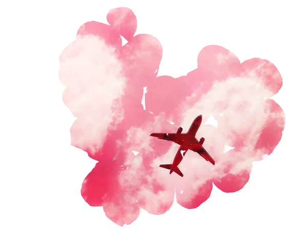 Διπλή έκθεση: αεροπλάνο στον ουρανό με σύννεφα και ροζ πέταλα σε μορφή της καρδιάς. — Φωτογραφία Αρχείου