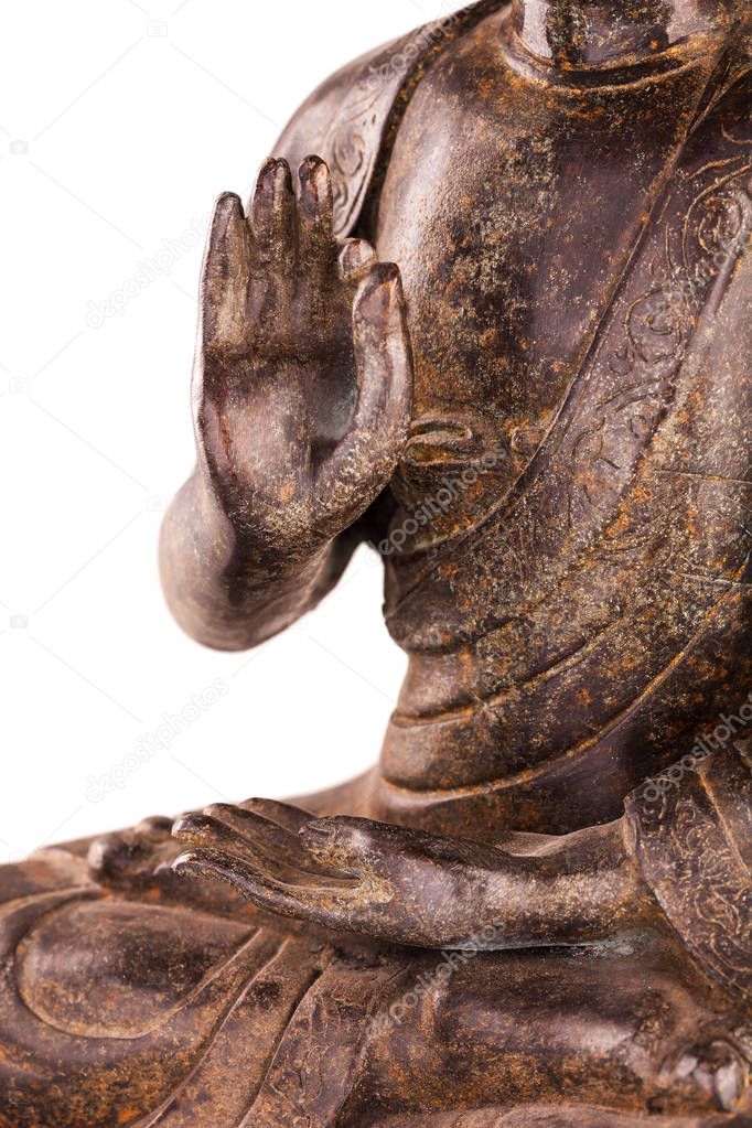 Buddha's hands in position vitarka mudra - close up.