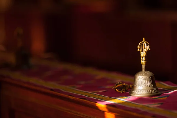 Hand bell, enlightenment and sunlight — Stock Photo, Image