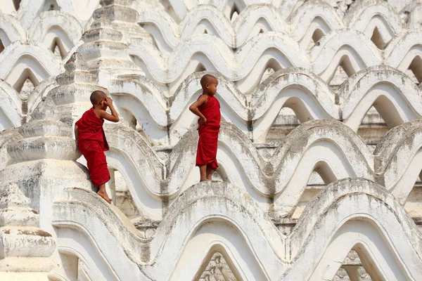Myanmar novice two were climbing the pagoda — Stock Photo, Image