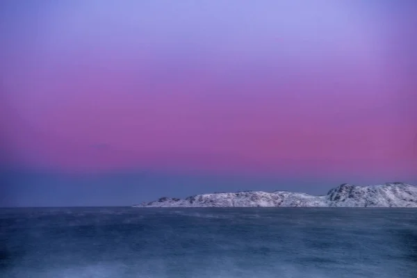 Snowy coast of Barents Sea in Teriberka, Murmansk Region, Russia