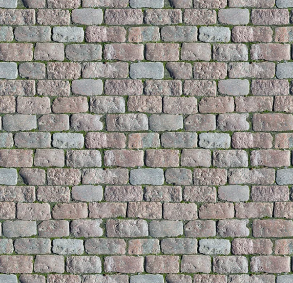 Stenstensbeläggning. Granit kullerstenad trottoar bakgrund. Abstrakt bakgrund av gamla kullersten trottoaren närbild. Sömlös konsistens. Perfekt kaklat på alla sidor — Stockfoto