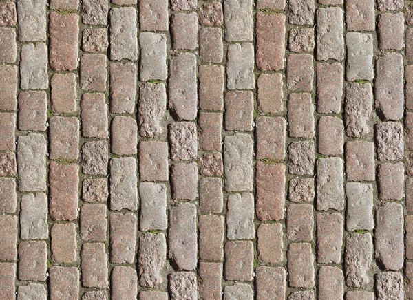 Textura do pavimento de pedra. Granito calçada fundo pavimento. Fundo abstrato de calçada de paralelepípedo antigo close-up. Textura sem costura. Telha perfeita em todos os lados — Fotografia de Stock