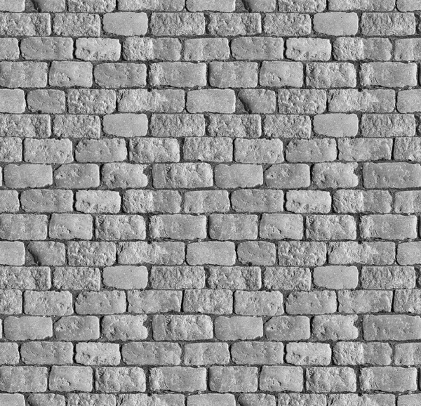 Taş kaldırım dokusu. Granit kaldırım taşlı zemin. Eski kaldırım kaldırımının soyut arkaplanı. Kusursuz bir doku. Her tarafı mükemmel döşenmiş.