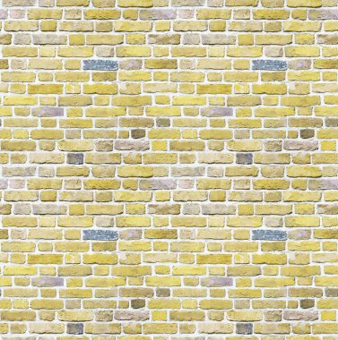 Arka plan sorunsuz yakından kahverengi bej tuğla duvar. 