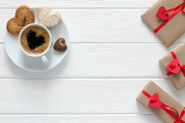 Valentines Day Concept wrapped Gifts Coffee with Candies on Wood — Stock Photo, Image