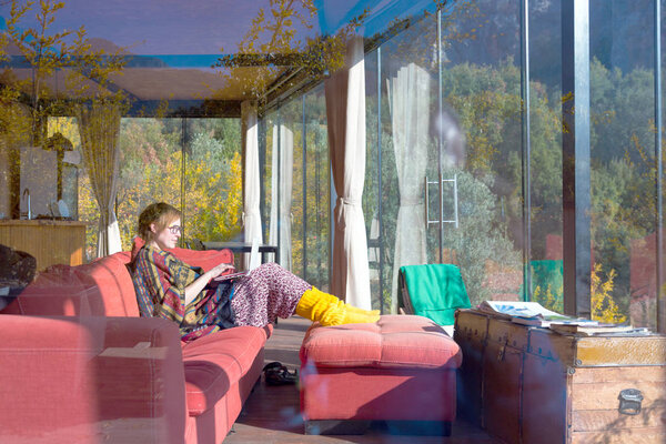 Lady in Poncho working on Computer