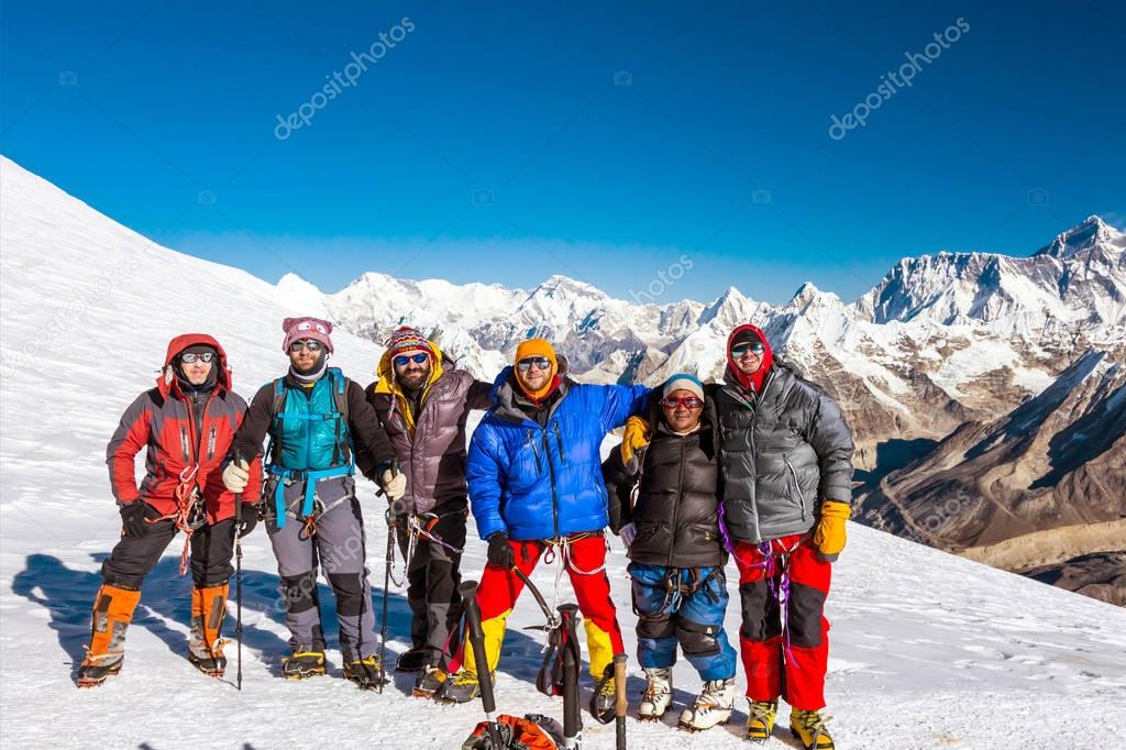 Climbers in warm high altitude jackets