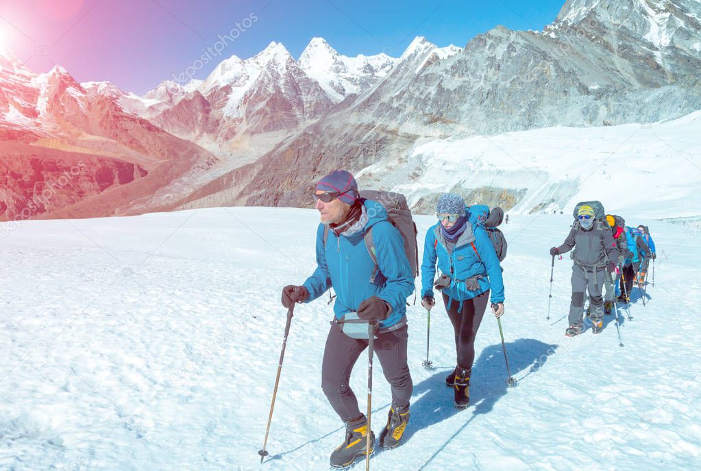 Group of Climbers walking on Glacier