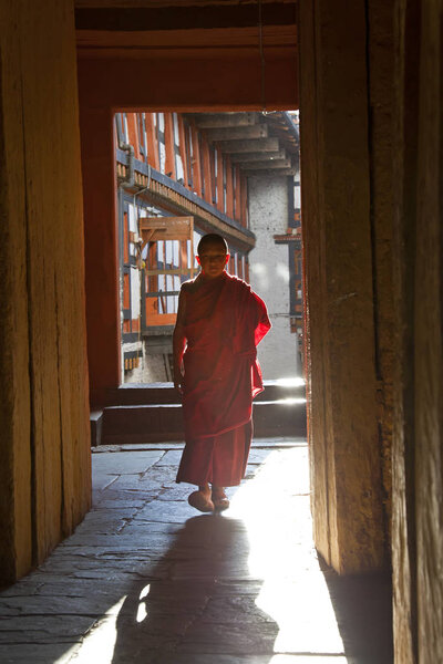 Monk, Jakar Dzong or monastery Jakar Bumthang Bhutan
