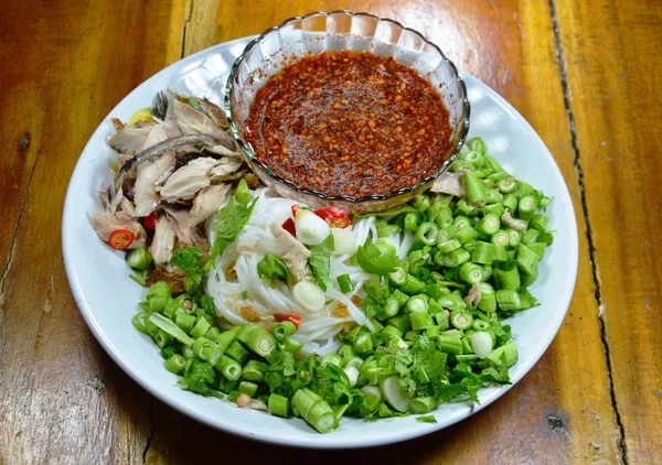 Rice noodle mackerel salad with spicy and sour sauce — Stock Photo, Image