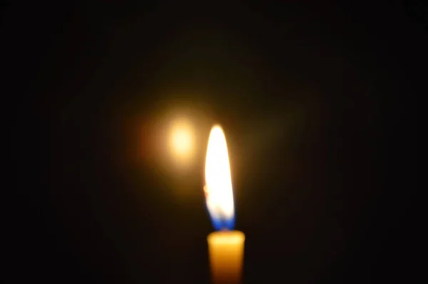 Blurry candle light in the dark — Stock Photo, Image