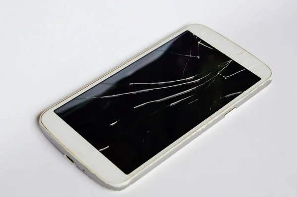 Crack touch screen of white mobile phone — Stock Photo, Image