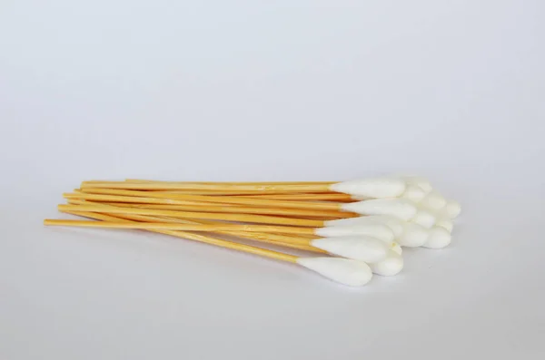 Cotton bud with long wooden stick on white background — Stock Photo, Image