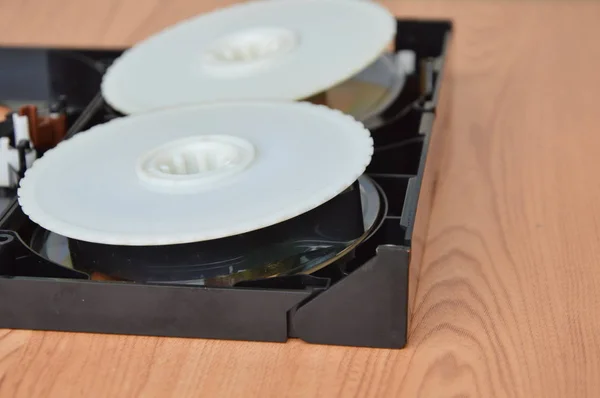 video tape recorder reel on desk