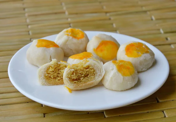 Chinese pastry filling sweet bean and salty egg yolk on dish — Stock Photo, Image