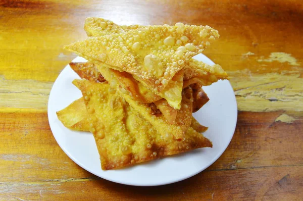 Deep fried crispy dumpling strips on plate — Stock Photo, Image