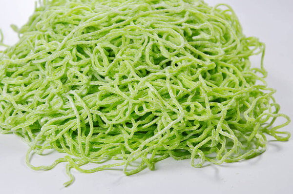 raw Chinese jade noodle prepare to cook on white paper