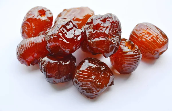 Chinese jujube candy coating syrup on white background — Stock Photo, Image