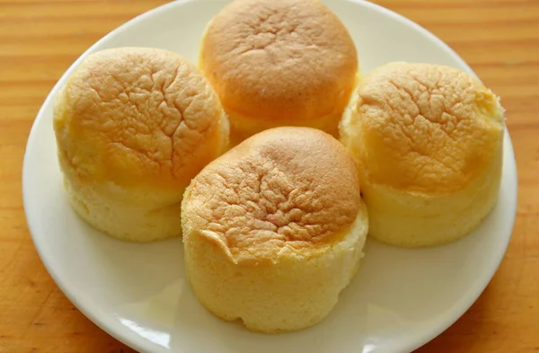 Fresh butter cupcake on plate — Stock Photo, Image