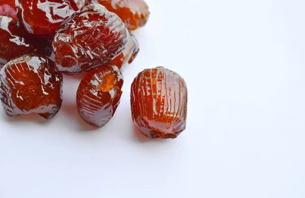 Chinese jujube candy coating syrup on white background — Stock Photo, Image