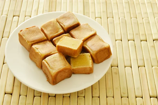 Chinese dice pasty stuffed mush sweet bean half cut on plate — Stock Photo, Image