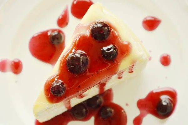 Crape cake dressing blueberry sauce on plate — Stock Photo, Image