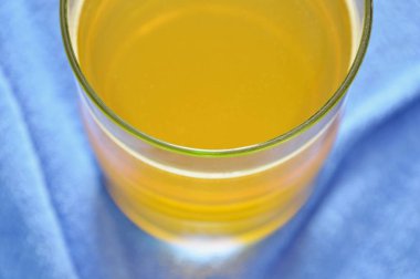 electrolyte orange flavor powder dissolution in freshwater clipart