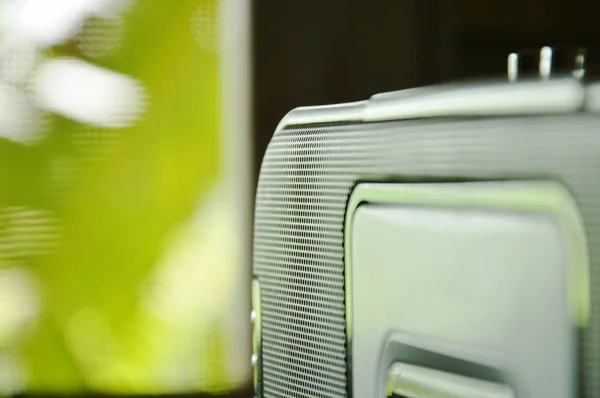 radio cassette tape recorder near window in home