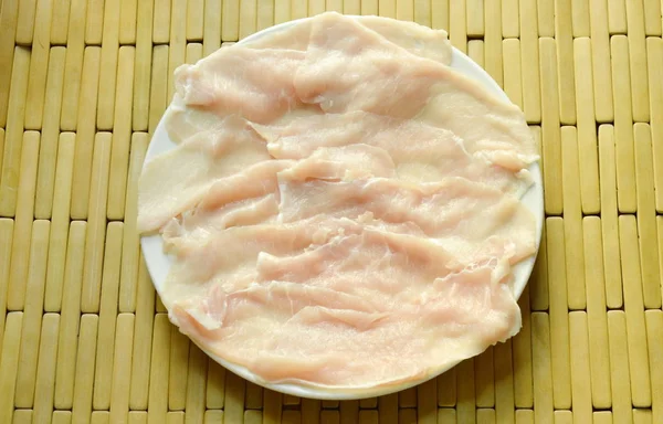クックの豚肉スライスで沸騰するかプレート焼き — ストック写真