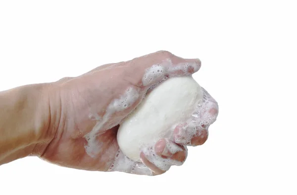 肥皂和少数在白色背景上的泡沫 — 图库照片