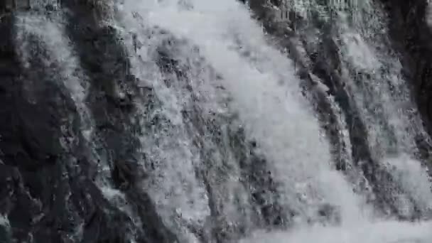 Waterfall falling and hit rock splashing to river — Stock Footage Waterfall falling and hit rock splashing to river Royalty Free Stock Footage