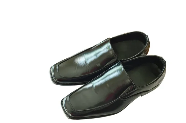 Чорне ділове шкіряне взуття на білому тлі — стокове фото