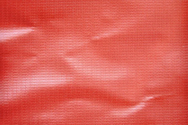 close up of red vinyl banner texture and background