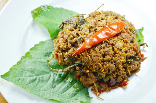 Spicy minced fried minced pork with herb on betel leaf — Stock Photo, Image