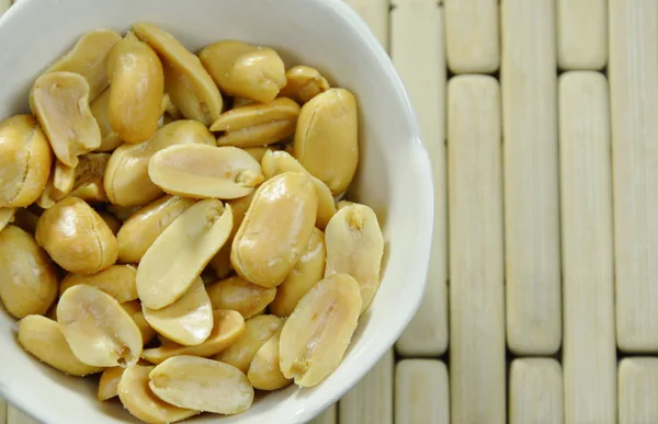 Baked salt peanuts on little cup — Stock Photo, Image