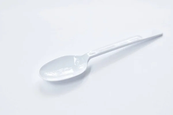 Plastic spoon for single used on white background — Stock Photo, Image