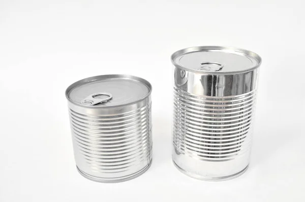 Tin can food with opener on white background — 스톡 사진