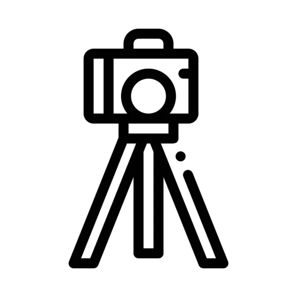 Câmera de vídeo com ilustração do contorno do vetor do ícone do tripé — Vetor de Stock