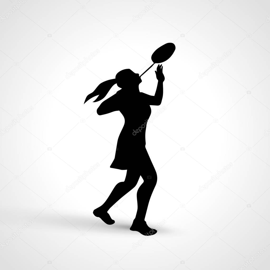 Creative silhouette of female badminton player