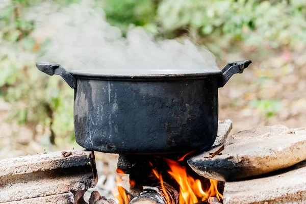 Old cooking pot stove using firewood. — Stock Photo, Image