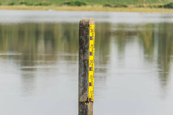 water level indicator at the waterway or swamp