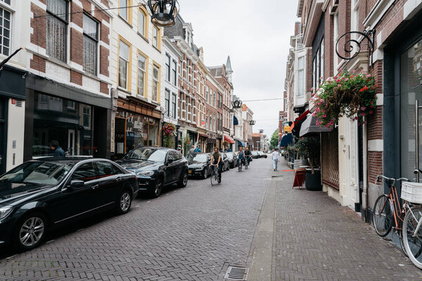 View of typical commercial street in the Hague  a cloudy day of 