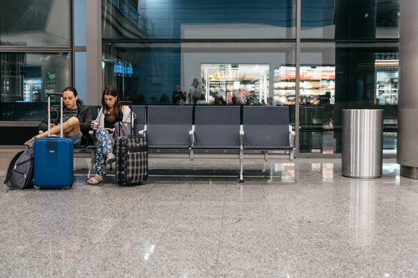 Passengers waiting for boarding in the airport of Madrid