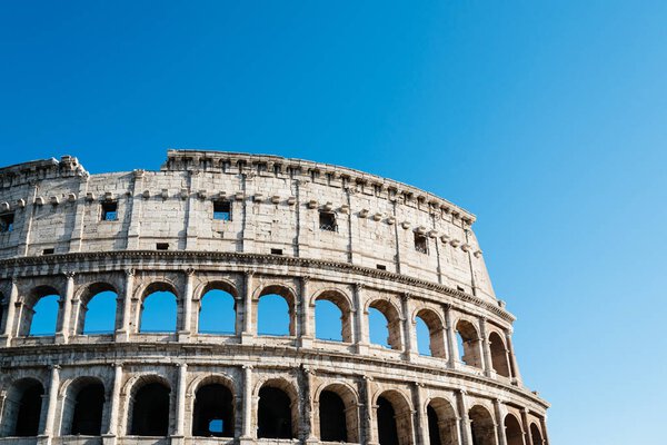 Outdoor view of The Colosseum or Coliseum, also known as the Flavian Amphitheatre. It is an oval amphitheatre in the centre of the city of Rome.