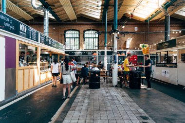 View of Markthalle Neun, a historical market with street food in Kreuzberg borough in Berlin