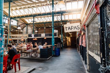 View of Markthalle Neun, a historical market with street food in Kreuzberg borough in Berlin