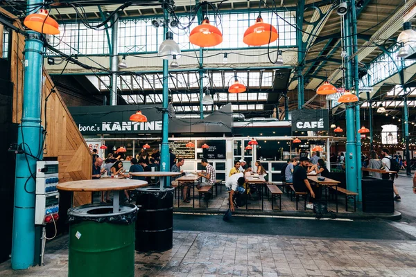 View of Markthalle Neun, a historical market with street food in Kreuzberg borough in Berlin