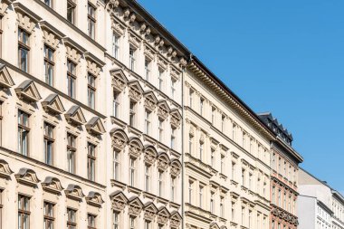 Low angle view of traditional residential buildings in Berlin Mitte clipart